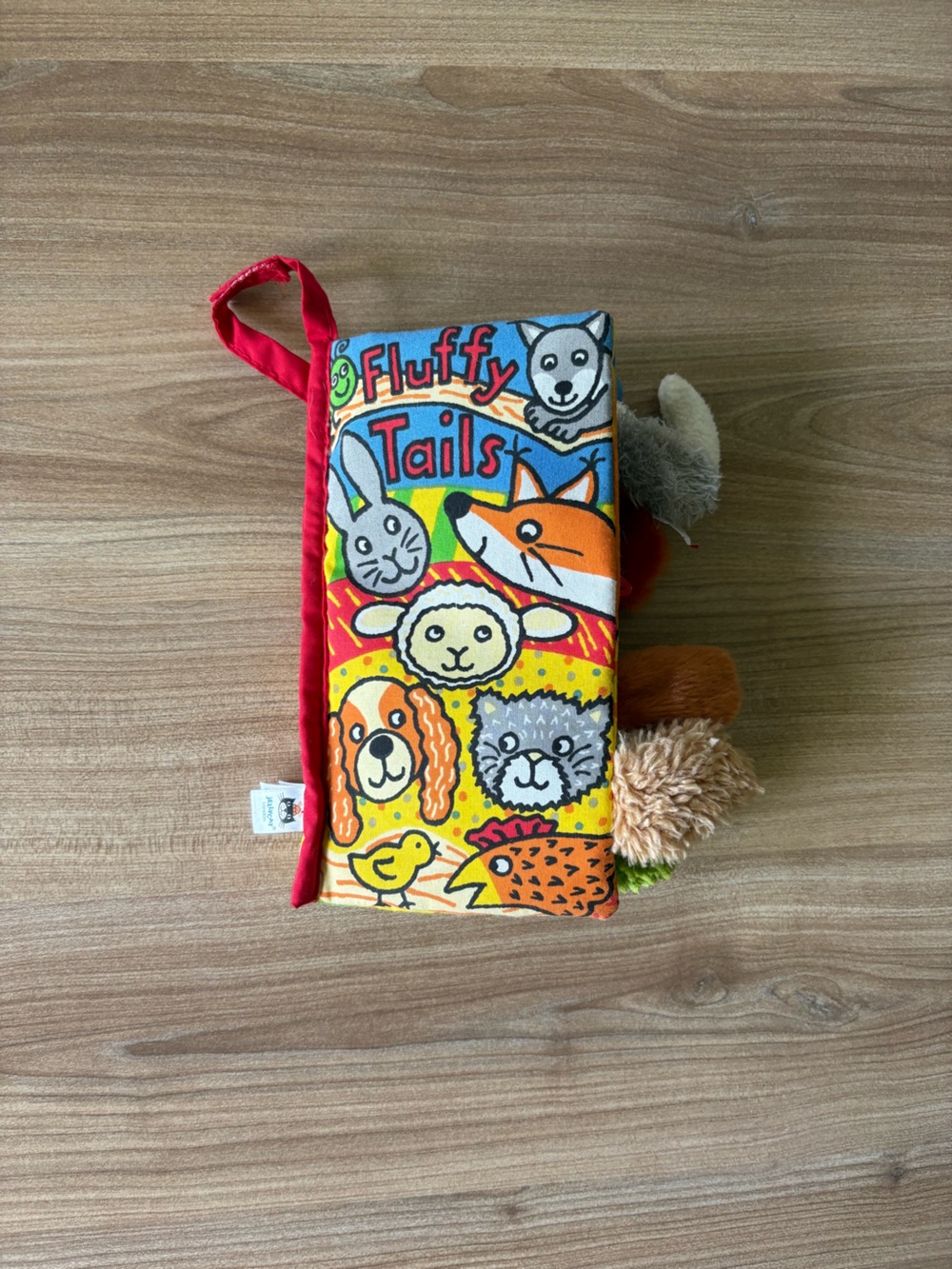 Jellycat Fluffy Tails Book for babies